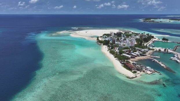 Aerial view of Gulhi island and turquoise lagoon Maldives. Aerial view of Gulhi island and turquoise lagoon Maldives.