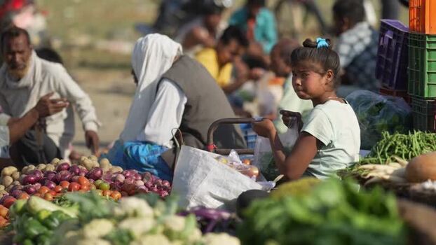 View of people at a local vegetable market in Dhangadhi Nepal. View of people at a local vegetable market in Dhangadhi Nepal.