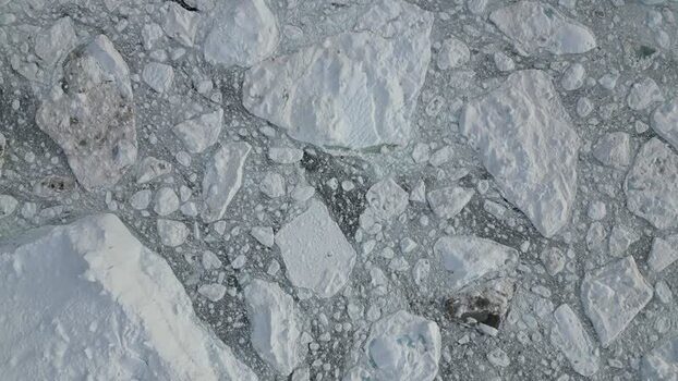 Aerial view of Ilulissat icebergs in Greenland. Aerial view of Ilulissat icebergs in Greenland.