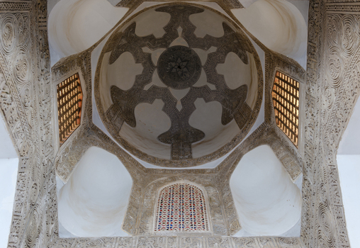 View of the intricate interior dome of Al Azhar Mosque featuring detailed stone carvings and geometric patterns Cairo Egypt. View of the intricate interior dome of Al Azhar Mosque featuring detailed stone carvings and geometric patterns Cairo Egypt.
