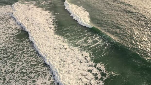 Aerial view of waves at Praia da Mata Portugal. Aerial view of waves at Praia da Mata Portugal.