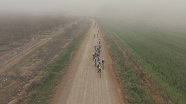 Aerial view of cyclists on a dirt road in Greyton South Africa. Aerial view of cyclists on a dirt road in Greyton South Africa.