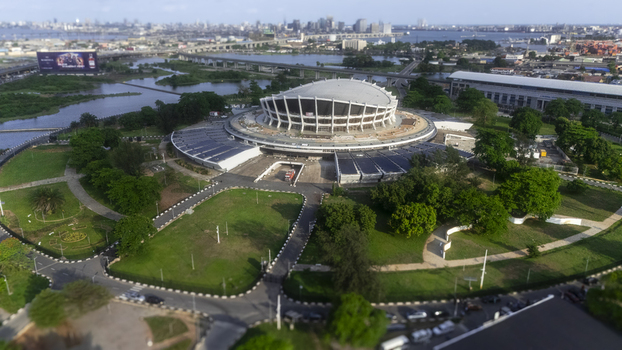 Aerial view of the Wole Soyinka Centre for Culture and Creative Arts known as the National Theatre with its unique architecture and green grounds in Lagos Lagos Nigeria. Aerial view of the Wole Soyinka Centre for Culture and Creative Arts known as the National Theatre with its unique architecture and green grounds in Lagos Lagos Nigeria.
