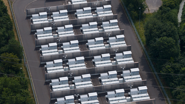 Aerial view of Battery Energy Storage Park Beside Traditional Power Plant Aerial view of Battery Energy Storage Park Beside Traditional Power Plant