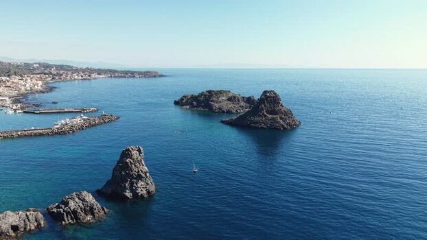 Aerial view of Islands of the Cyclops and the coastline Italy.