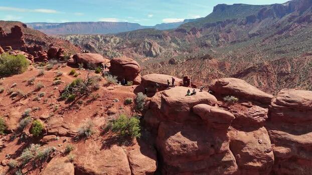 Aerial view of people on Fisher Towers in Grand County Utah United States. Aerial view of people on Fisher Towers in Grand County Utah United States.