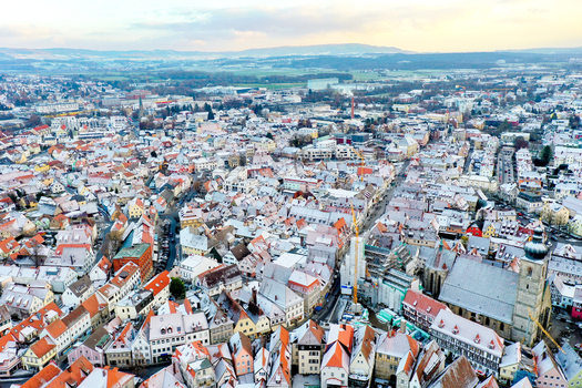 Aerial view of Rathaus Forchheim and the historic old town with snow dusted rooftops and St. Martin s Church under a winter sky in Forchheim Bayern Germany. Aerial view of Rathaus Forchheim and the historic old town with snow dusted rooftops and St. Martin s Church under a winter sky in Forchheim Bayern Germany.