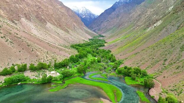 Aerial view of the lush valley near Qullai Vudor Tajikistan. Aerial view of the lush valley near Qullai Vudor Tajikistan.