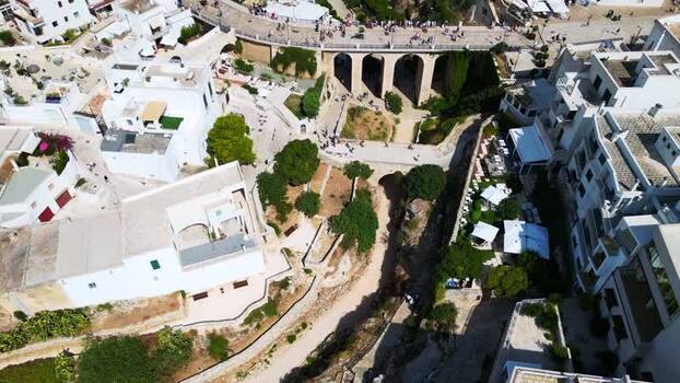 Aerial view of Polignano a Mare bridge and beach Italy.