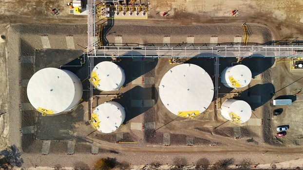 Grand Junction Colorado United States 03 July 2026 Aerial view of storage tanks at an industrial facility with connecting pipes and gravel ground. Grand Junction Colorado United States 03 July 2026 Aerial view of storage tanks at an industrial facility with connecting pipes and gravel ground.