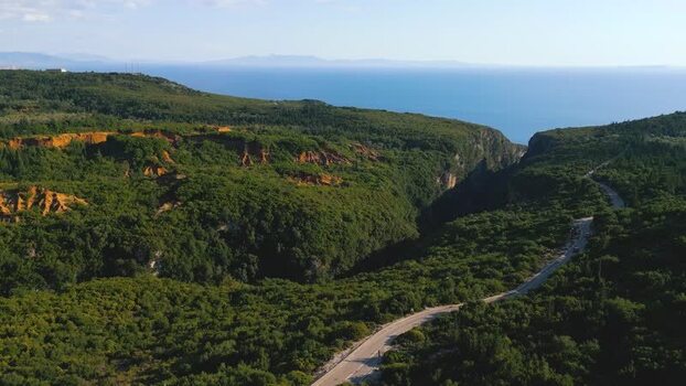 Aerial view of Gjipe Canyon and winding road Albania. Aerial view of Gjipe Canyon and winding road Albania.