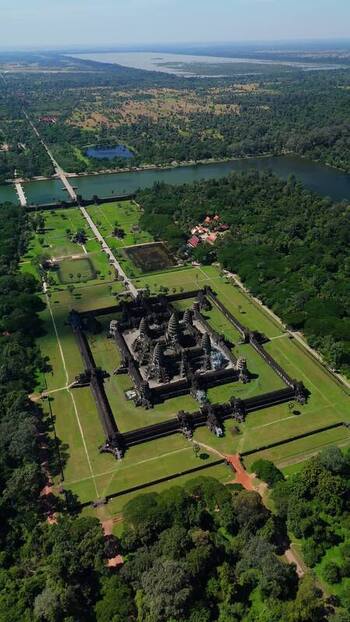 Aerial view of Angkor Wat temple complex in Cambodia. Aerial view of Angkor Wat temple complex in Cambodia.