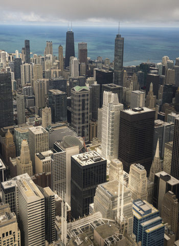 Chicago United States 15 September 2025 View of the dense urban skyline with skyscrapers and Lake Michigan under an overcast sky.
