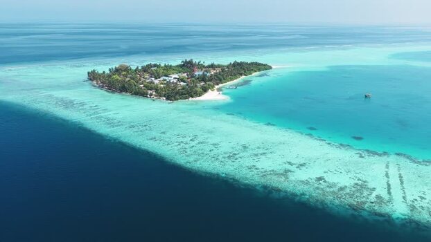 Aerial view of tropical island and coral reef Maldives. Aerial view of tropical island and coral reef Maldives.