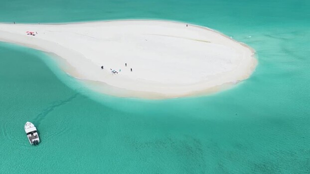 Aerial view of a white sandbank and boat in turquoise water Maldives. Aerial view of a white sandbank and boat in turquoise water Maldives.