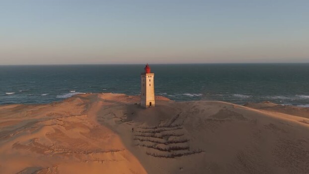 Aerial view of Rubjerg Knude lighthouse in Denmark.