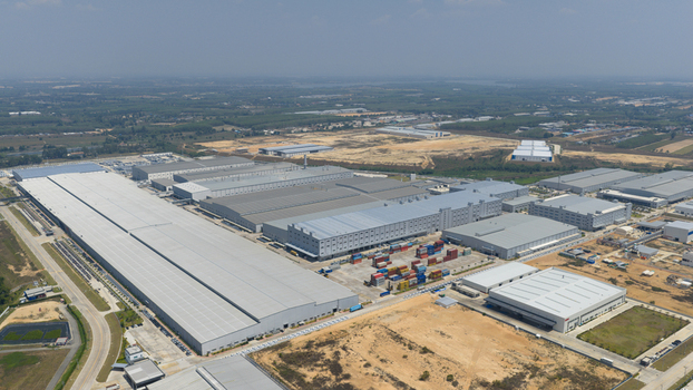 Aerial view of the BYD Thailand Rayong Office Building and industrial complex with large warehouses and shipping containers Phananikhom Rayong Thailand. Aerial view of the BYD Thailand Rayong Office Building and industrial complex with large warehouses and shipping containers Phananikhom Rayong Thailand.
