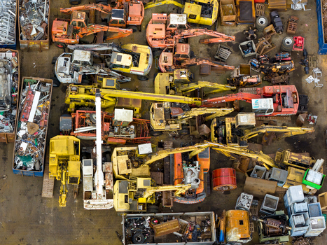 Aerial view of scrapped cars and crushed metal debris piled in a junkyard and recycling site in Hoogeveen Drenthe Netherlands. Aerial view of scrapped cars and crushed metal debris piled in a junkyard and recycling site in Hoogeveen Drenthe Netherlands.