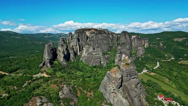 Aerial view of Meteora rock formations and monasteries Greece.