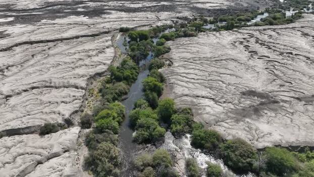Aerial view of a river flowing through the Danakil Desert Ethiopia. Aerial view of a river flowing through the Danakil Desert Ethiopia.