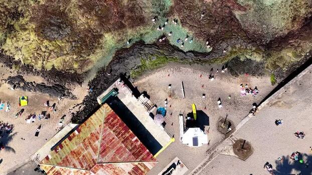 Aerial view of Kahalu u Beach Park with people on the shore United States.