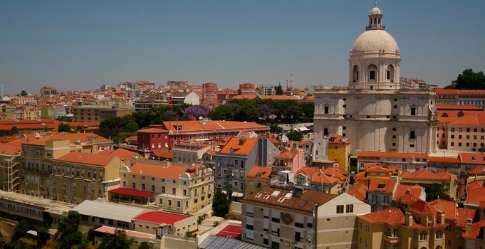 Aerial view of the National Pantheon surrounded by historic terracotta rooftops and dense urban architecture in Lisboa Lisboa Portugal. Aerial view of the National Pantheon surrounded by historic terracotta rooftops and dense urban architecture in Lisboa Lisboa Portugal.