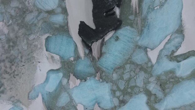 Aerial view of blue icebergs in Fjallsarlon lagoon Iceland. Aerial view of blue icebergs in Fjallsarlon lagoon Iceland.