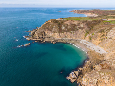 Aerial view of the rugged cliffs of Nez de Jobourg with turquoise waters and rocky coastline La Hague Normandie France. Aerial view of the rugged cliffs of Nez de Jobourg with turquoise waters and rocky coastline La Hague Normandie France.