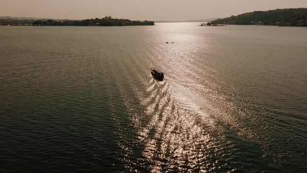 Aerial view of a boat on Lake Peten Itza Guatemala.