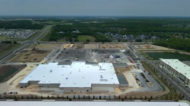 Aerial view of a large retail construction site United States. Aerial view of a large retail construction site United States.
