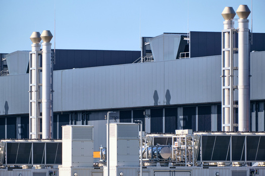 Middenmeer Netherlands 14 April 2026 View of the Microsoft datacenter AMS13 featuring industrial ventilation stacks and cooling systems under a clear blue sky. Middenmeer Netherlands 14 April 2026 View of the Microsoft datacenter AMS13 featuring industrial ventilation stacks and cooling systems under a clear blue sky.