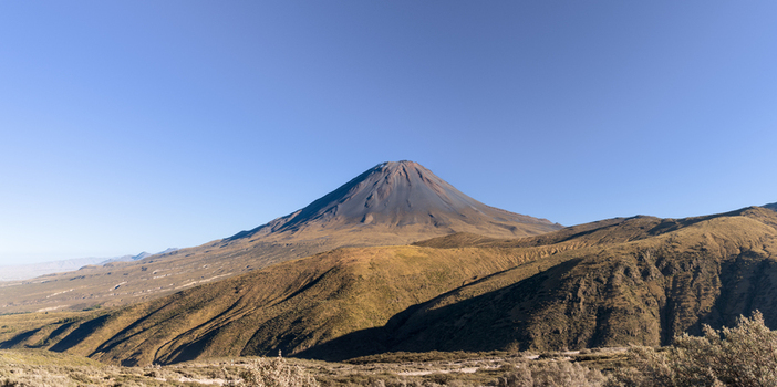 View of Misti volcano rising above the arid landscape under a clear blue sky in Arequipa Arequipa Peru. View of Misti volcano rising above the arid landscape under a clear blue sky in Arequipa Arequipa Peru.