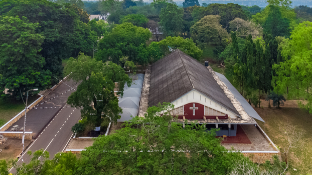 Aerial view of Achimota School chapel surrounded by lush green trees and vegetation in Achimota Greater Accra Region Ghana. Aerial view of Achimota School chapel surrounded by lush green trees and vegetation in Achimota Greater Accra Region Ghana.