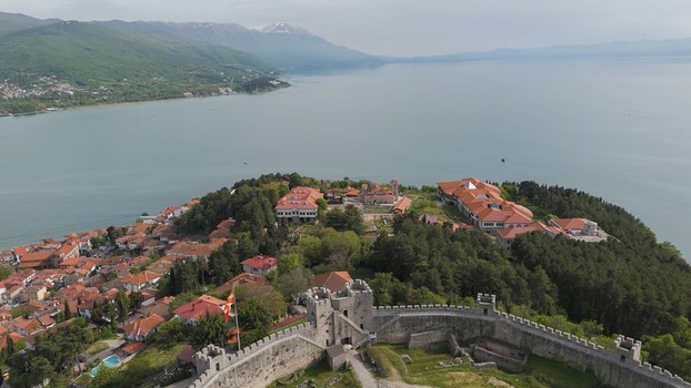 Aerial view of Samuel s Fortress overlooking the historic town of Ohrid with terracotta rooftops lush trees and Lake Ohrid Ohrid Municipality of Ohrid North Macedonia. Aerial view of Samuel s Fortress overlooking the historic town of Ohrid with terracotta rooftops lush trees and Lake Ohrid Ohrid Municipality of Ohrid North Macedonia.