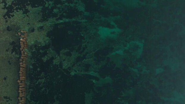 Aerial view of turquoise waters near Island of Ortigia Italy. Aerial view of turquoise waters near Island of Ortigia Italy.