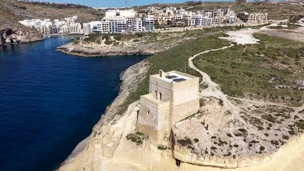 Aerial view of Xlendi Tower on the cliffs of Gozo Malta. Aerial view of Xlendi Tower on the cliffs of Gozo Malta.