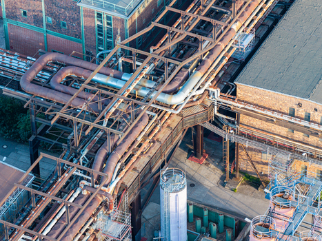 Aerial view of the Heizkraftwerk Klingenberg combined heat and power plant featuring complex industrial piping systems and brick architecture in Berlin Berlin Germany. Aerial view of the Heizkraftwerk Klingenberg combined heat and power plant featuring complex industrial piping systems and brick architecture in Berlin Berlin Germany.