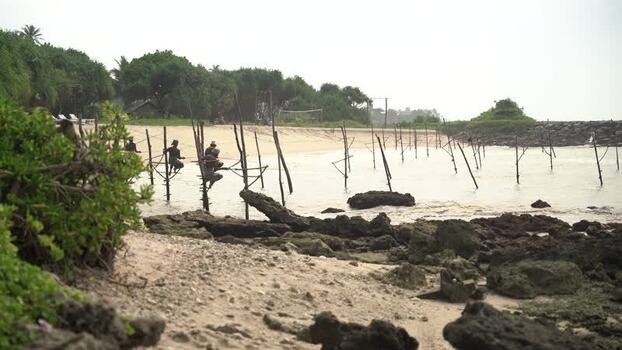 View of stilt fishermen on the coast of Koggala Sri Lanka. View of stilt fishermen on the coast of Koggala Sri Lanka.