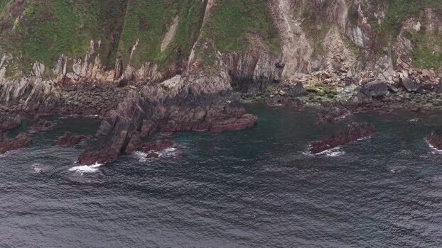 Aerial view of the rugged rocky coastline and steep cliffs Spain. Aerial view of the rugged rocky coastline and steep cliffs Spain.