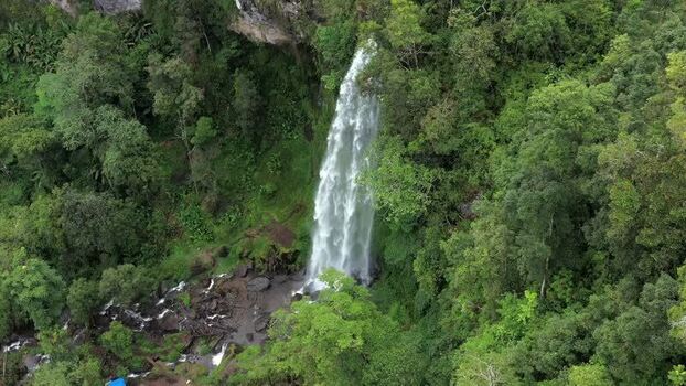 Aerial view of Waterfall Kayu Aro in Indonesia. Aerial view of Waterfall Kayu Aro in Indonesia.