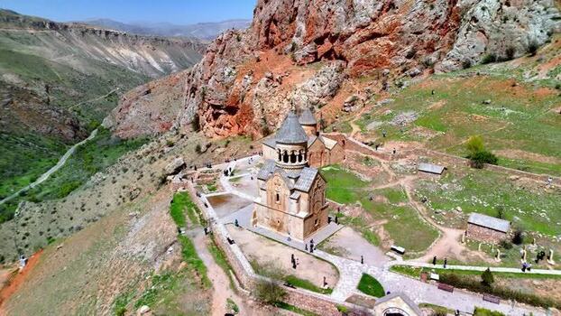 Aerial view of Noravank monastery and red rock cliffs Armenia.