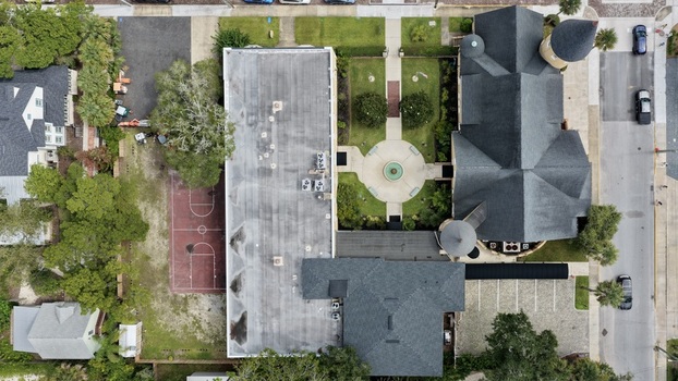 Aerial view of Ancient City Baptist Church with a central courtyard fountain basketball court and surrounding historic urban landscape in St. Augustine Florida United States. Aerial view of Ancient City Baptist Church with a central courtyard fountain basketball court and surrounding historic urban landscape in St. Augustine Florida United States.