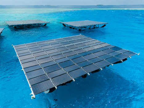 Aerial view of SolarSea floating solar power plant by Swimsol on turquoise ocean water Dharavandhoo Baa Atoll Maldives. Aerial view of SolarSea floating solar power plant by Swimsol on turquoise ocean water Dharavandhoo Baa Atoll Maldives.