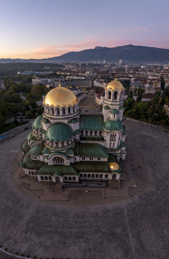 Aerial view of the golden domed Patriarchal Cathedral St. Alexander Nevsky surrounded by the historic city center of Sofia Sofia City Province Bulgaria. Aerial view of the golden domed Patriarchal Cathedral St. Alexander Nevsky surrounded by the historic city center of Sofia Sofia City Province Bulgaria.