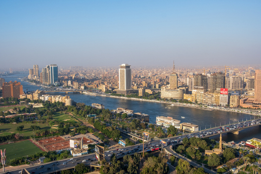 Cairo Egypt 19 October 2025 View of the Nile River snaking through the city framed by verdant trees and the iconic Cairo Tower piercing the skyline. Cairo Egypt 19 October 2025 View of the Nile River snaking through the city framed by verdant trees and the iconic Cairo Tower piercing the skyline.