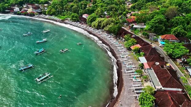 Aerial view of traditional boats along the coast Indonesia.