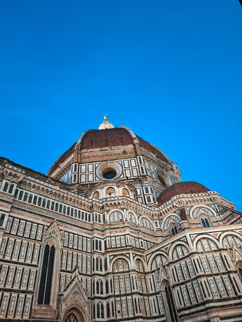 Florence Italy 26 April 2026 View of Florence Cathedral with its iconic red tiled dome and intricate marble facade under a clear blue sky. Florence Italy 26 April 2026 View of Florence Cathedral with its iconic red tiled dome and intricate marble facade under a clear blue sky.