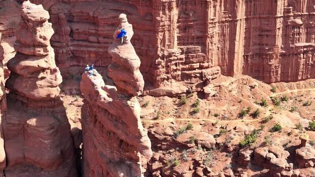 Aerial view of people on top of Fisher Towers in United States.