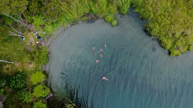Aerial view of people swimming in lake New Zealand. Aerial view of people swimming in lake New Zealand.