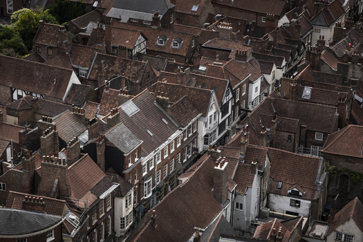 Aerial view of historic timber framed buildings and red tiled rooftops in the city center of York England United Kingdom.